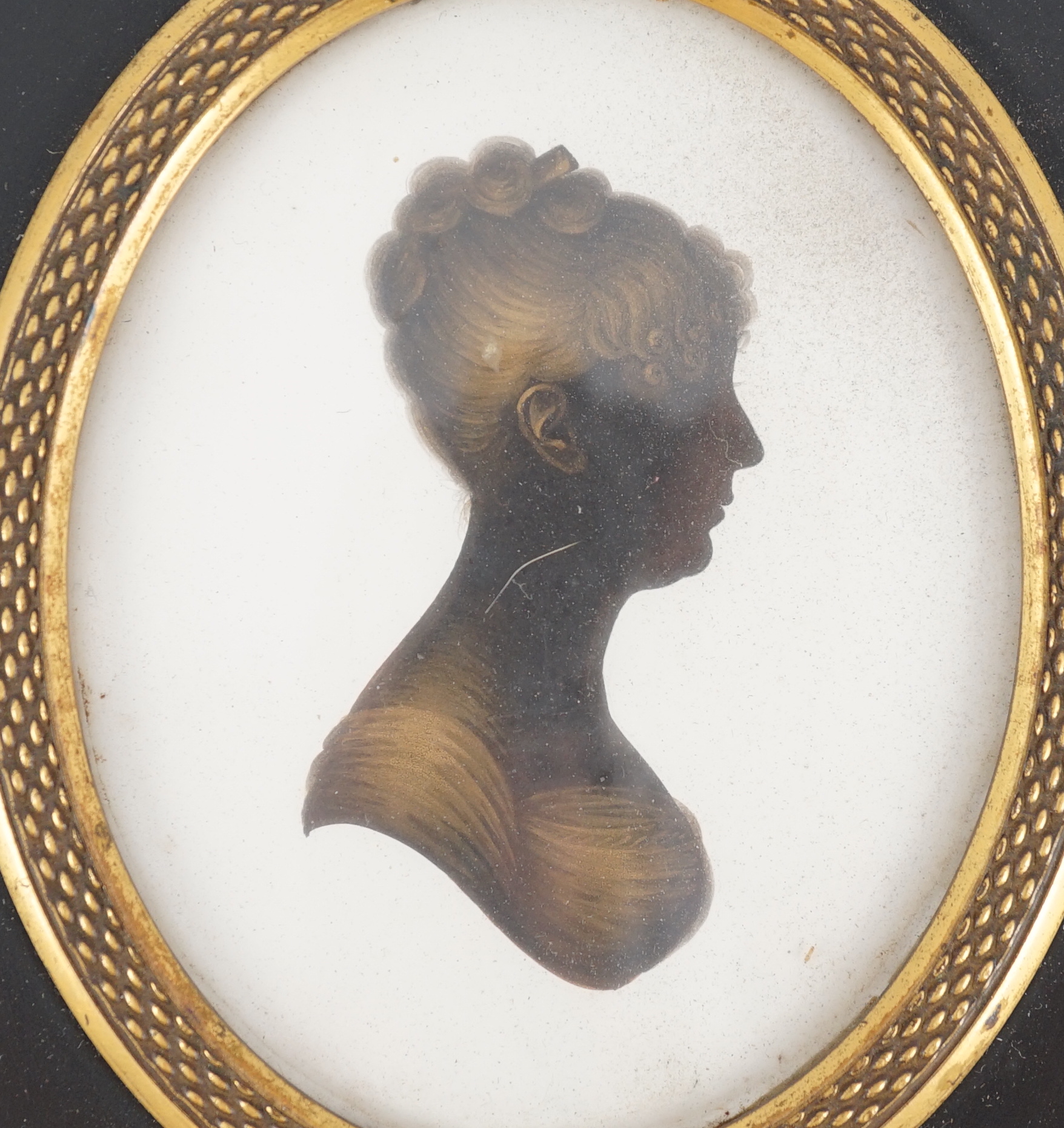 John Miers (1756-1821), Silhouettes of young ladies, painted and bronzed plaster (2), 8 x 6.5cm.